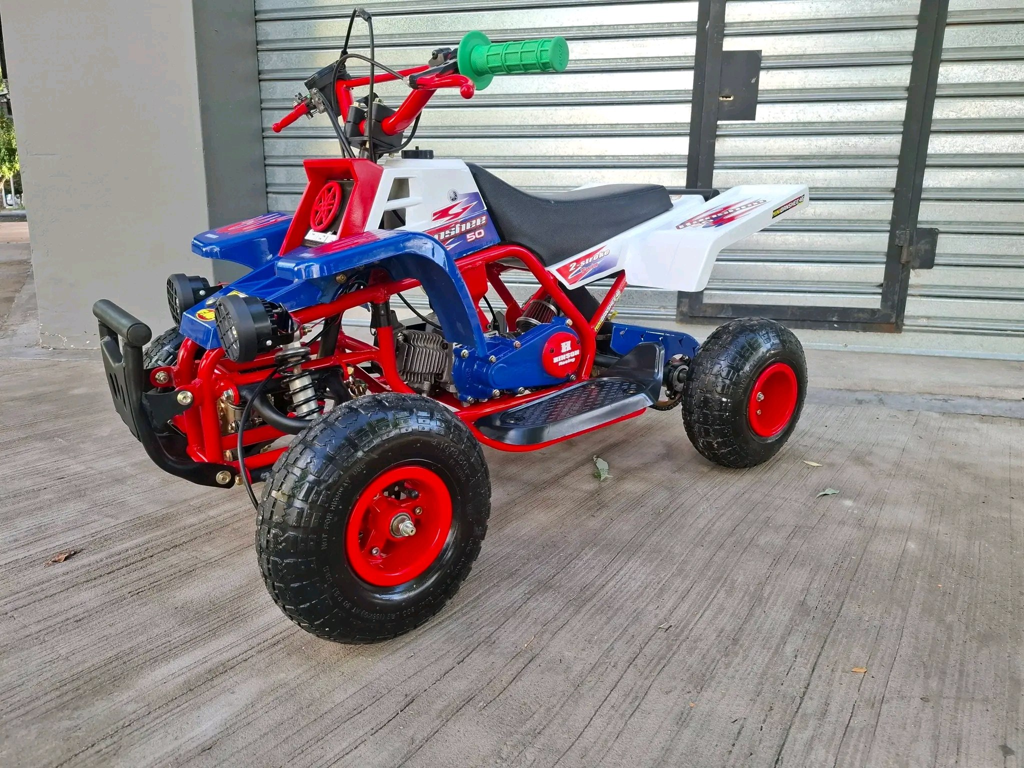 Mini Banshee ATV suspension system close-up