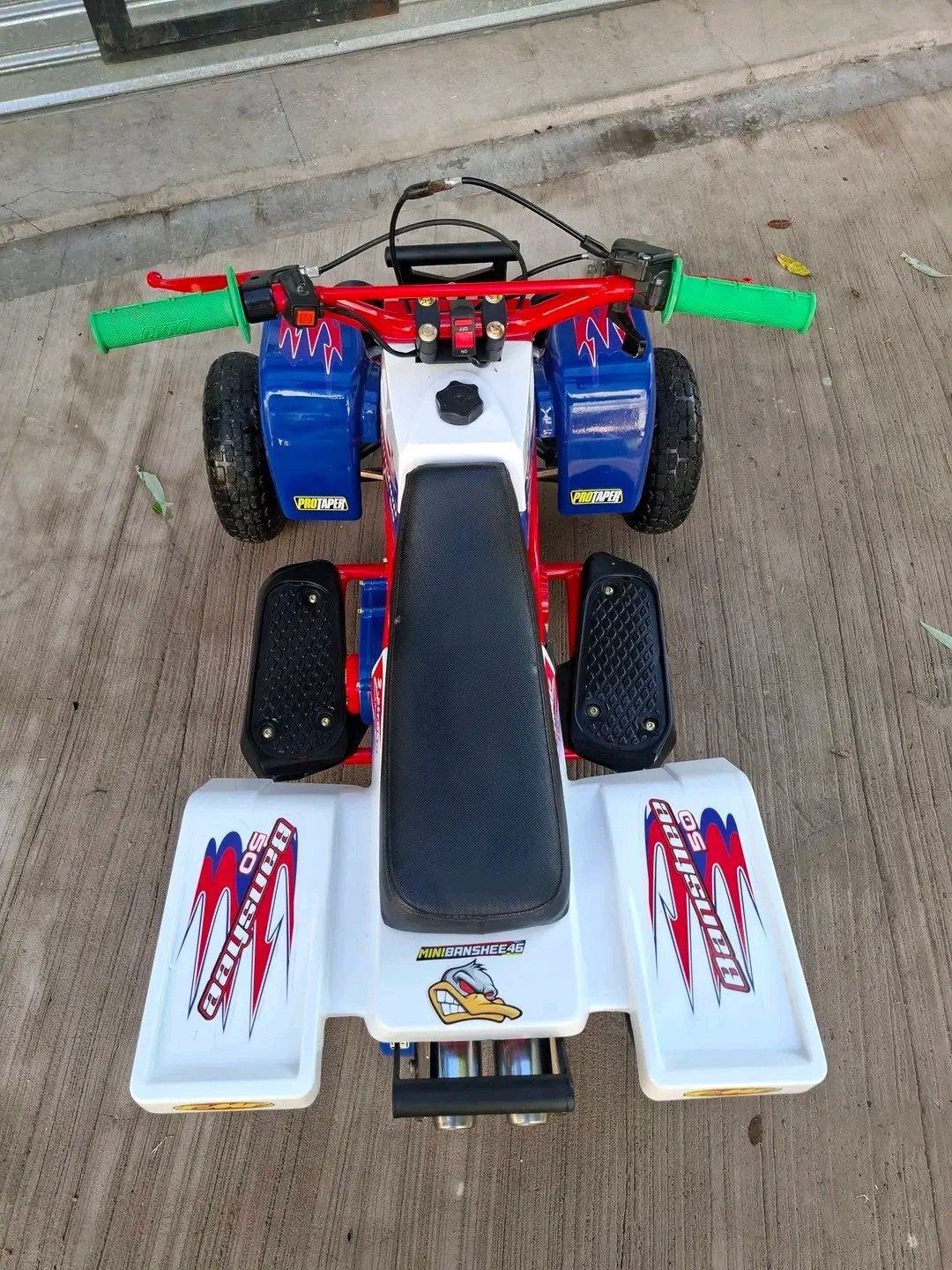 Mini Banshee ATV suspension system close-up