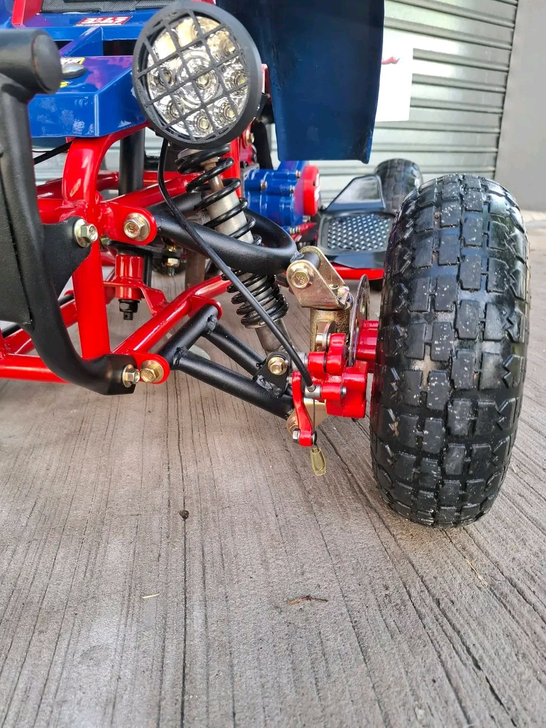Mini Banshee ATV suspension system close-up