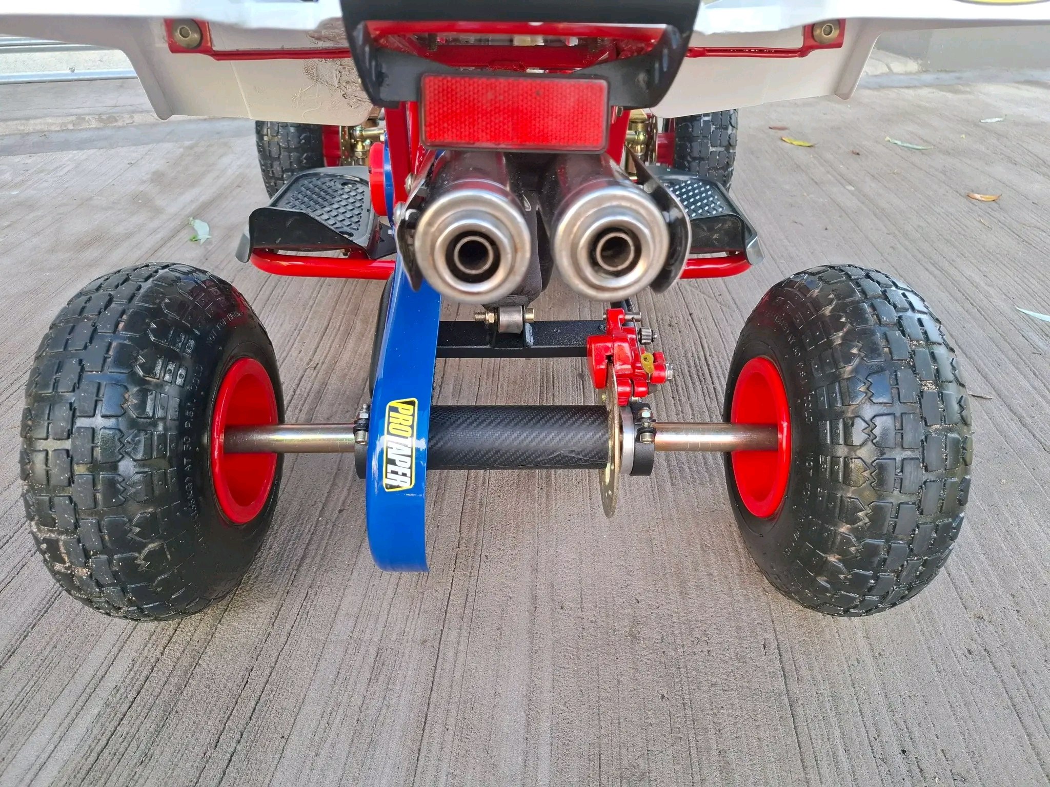 Mini Banshee ATV suspension system close-up