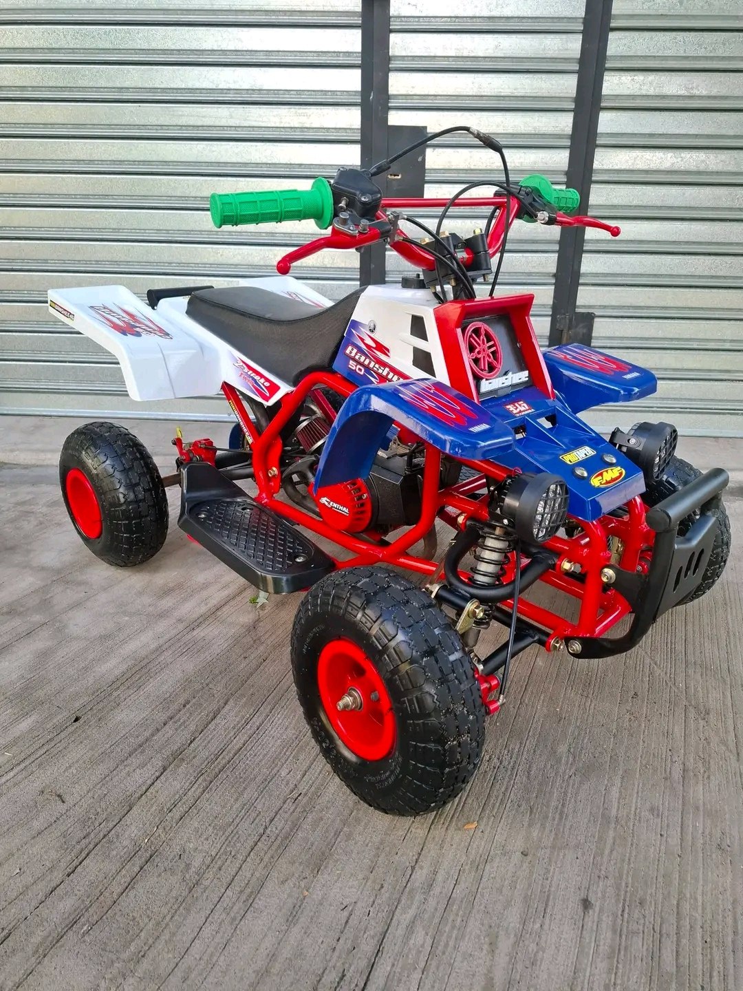 Mini Banshee ATV suspension system close-up